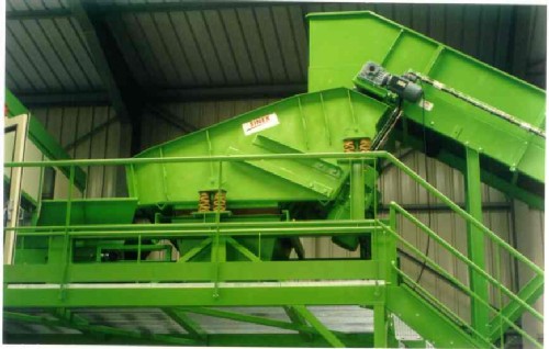 elektromechanische triltransporteur en grofzeef